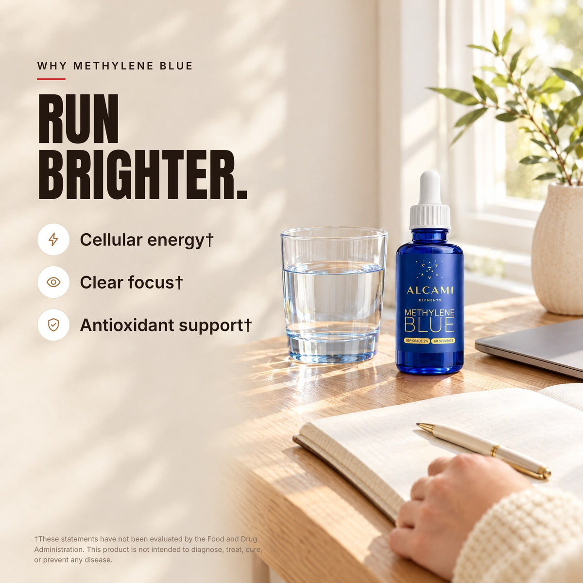 Run brighter: Alcami Methylene Blue bottle and a glass of water on a desk, for cellular energy, clear focus and antioxidant support